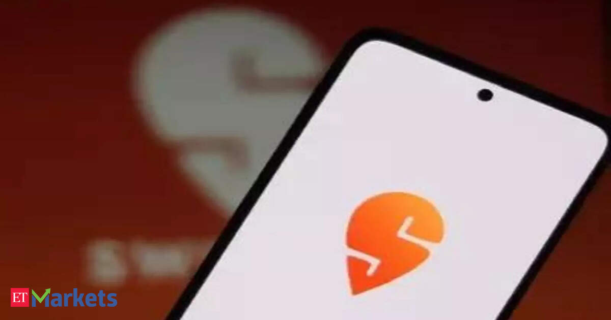 Brokerage firm JM Financial has downgraded Swiggy, citing concerns over its quick commerce arm, Instamart. They believe a takeover by a larger company is the best path for investors. JM Financial has significantly cut Swiggy's target price, valuing Instamart …